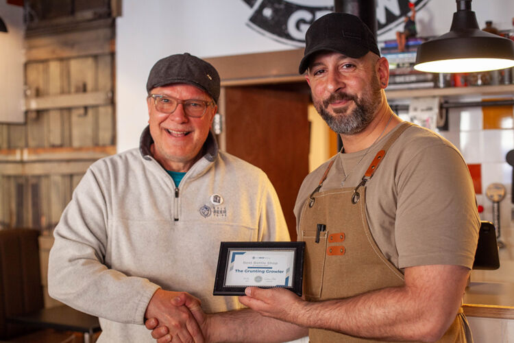 Captain Kurt presenting Grunting Growler award