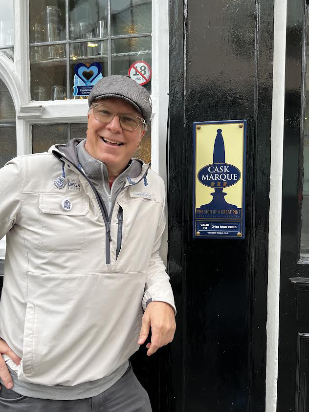 Captain Kurt next to Cask Marque Sign